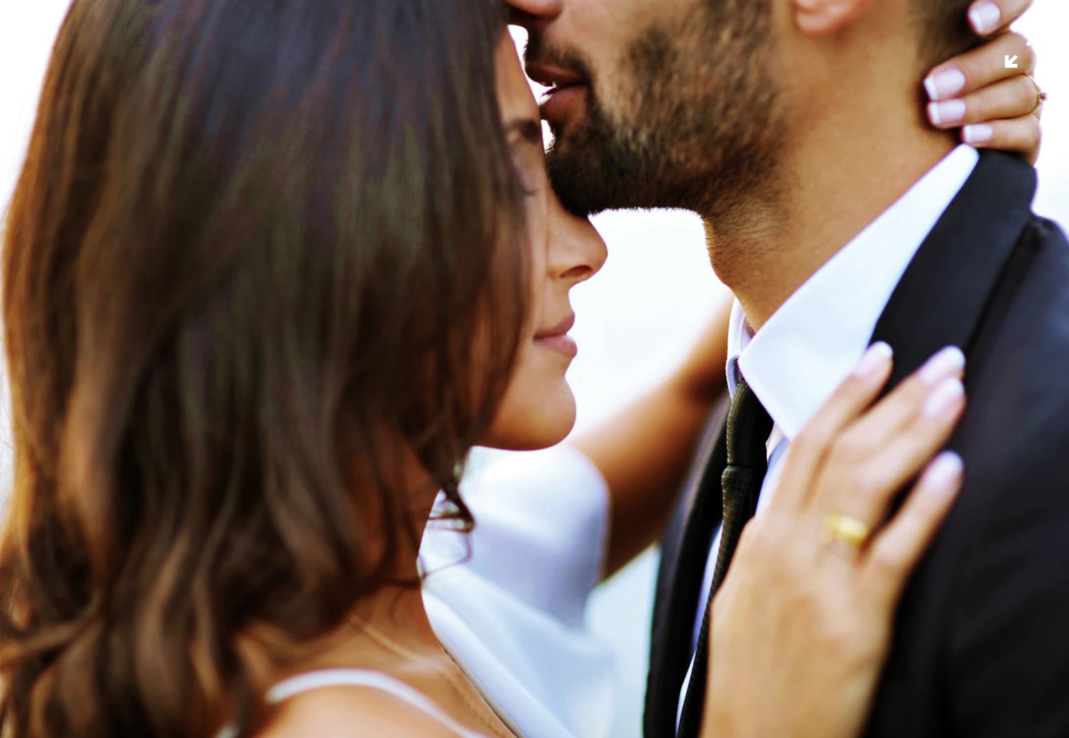 Photo of an older woman with a well dressed young man